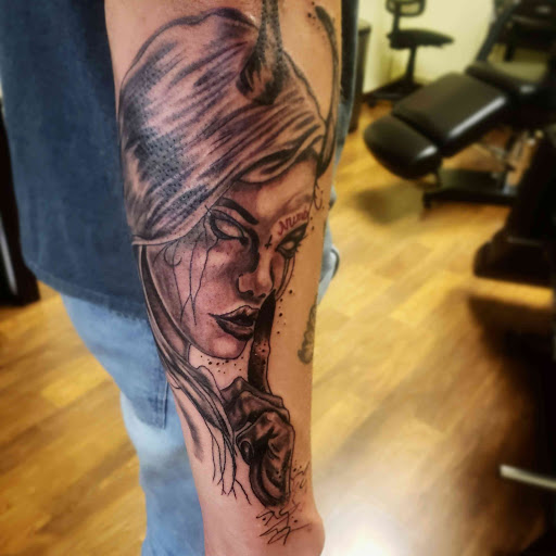Explore john wayne tattoo ideas, creative tattoo ideas in El Paso, available at Dead Hamster Tattoo