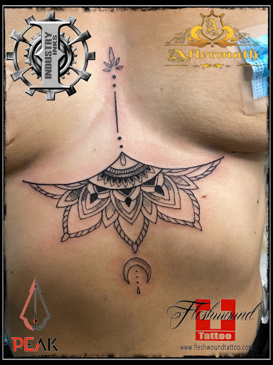 Explore flower shoulder tattoo ideas, creative tattoo ideas in Moweaqua, available at Fleshwound Tattoo
