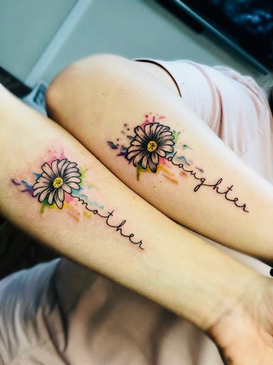 Explore swimming tattoo ideas, creative tattoo ideas in Amarillo, available at Tattoo Spa LLC