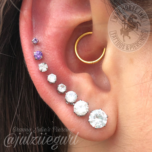 Explore iris flower tattoo ideas, creative tattoo ideas in Kent, available at War Horse Ink