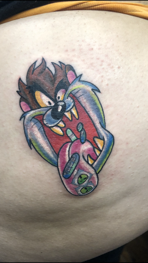 Find red indian tattoo ideas for your next unique tattoo in Garden Grove at Ashes 2 Ink Tattoo and Piercing LLC