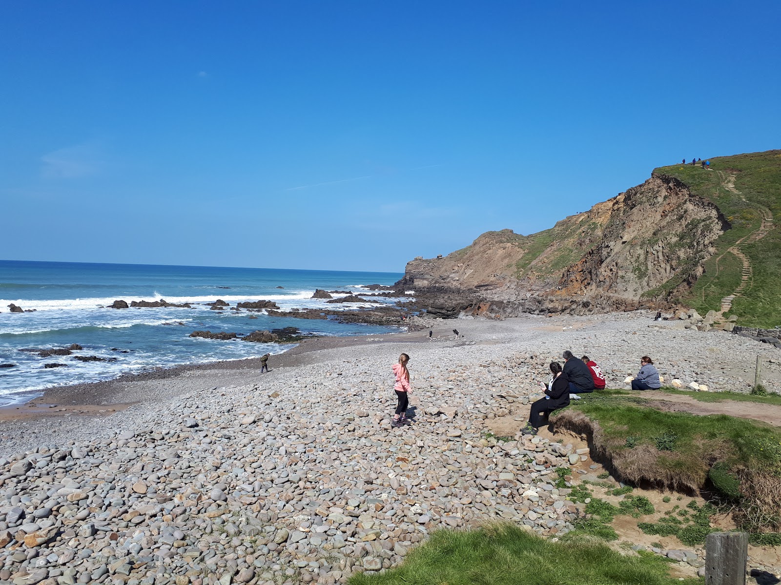 Foto van Northcott Mouth beach en de nederzetting