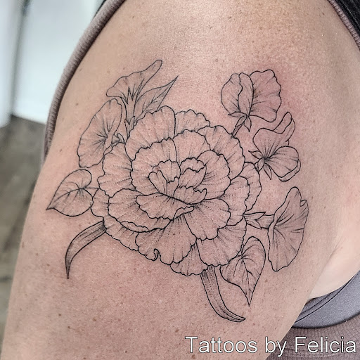 Explore sunlight tattoo ideas, creative tattoo ideas in Fort Myers, available at Tiger Lotus Tattoo and Piercing