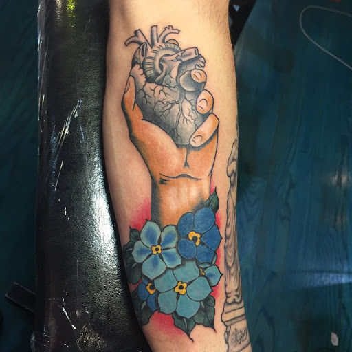 Explore behind the ear tattoo ideas, creative tattoo ideas in Reno, available at Aces Tattoo