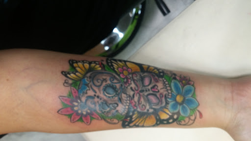 Explore tattoo book ideas, creative tattoo ideas in Destin, available at Atomic Frog Tattoo