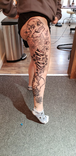 Explore money bag tattoo ideas, creative tattoo ideas in Cornelia, available at Prismatic Pulse Tattoo