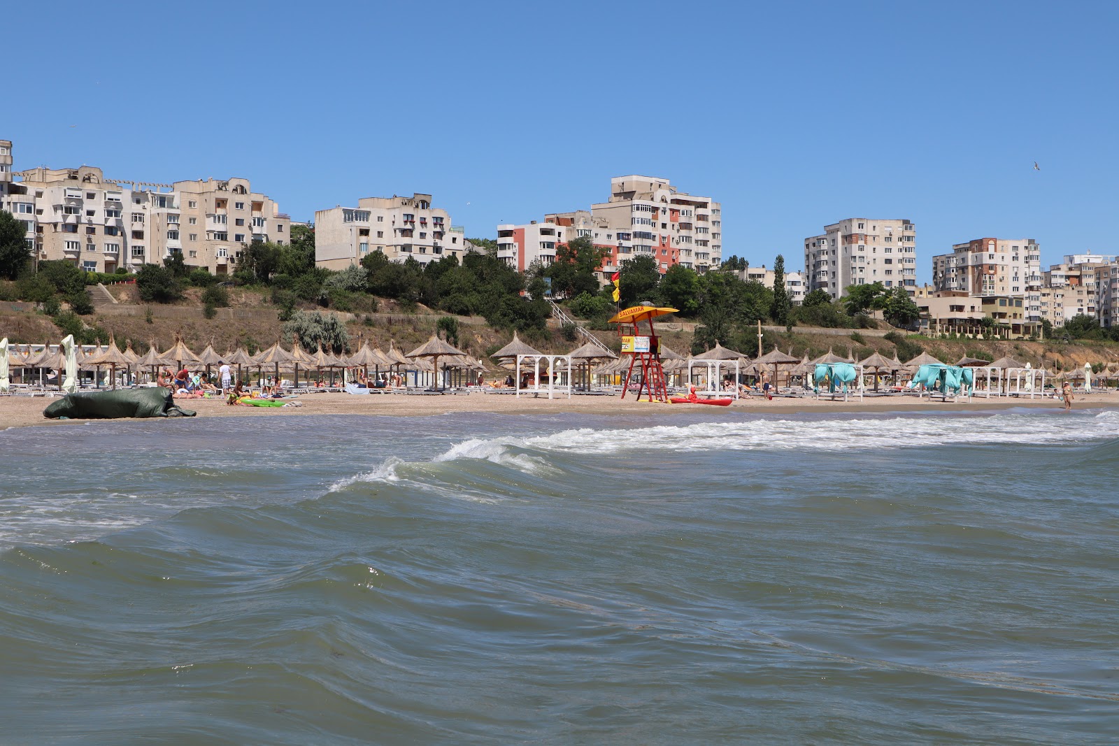 Fotografie cu Plyazh III Papuci zonă de stațiune de pe plajă
