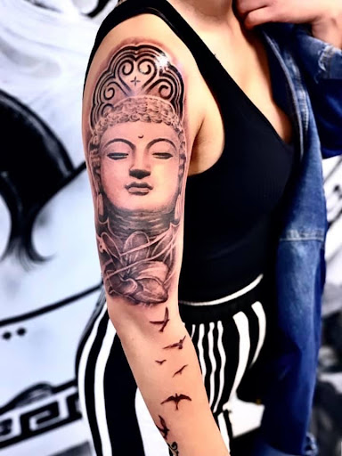 Find breast tattoo ideas for your next unique tattoo in Saint Paul at Supreme Art Of War Inc