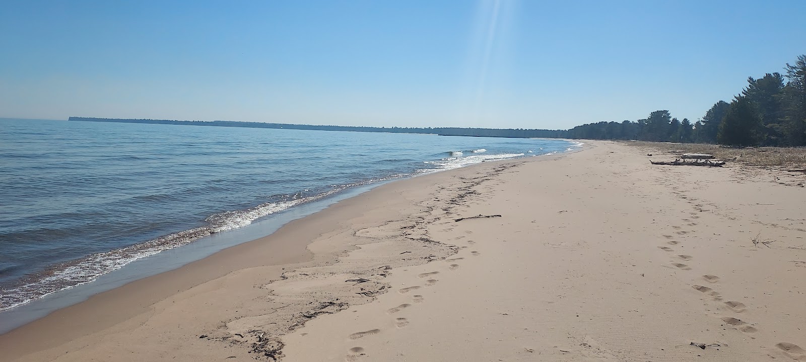 Foto di Bete Gris Beach con una superficie del sabbia luminosa
