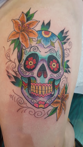 Explore statue tattoo ideas, creative tattoo ideas in Reno, available at Aces Tattoo