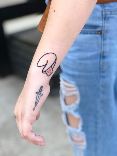 Explore tattoo ideas for guys with daughters, creative tattoo ideas in Dayton, available at 33 Lions Tattoo