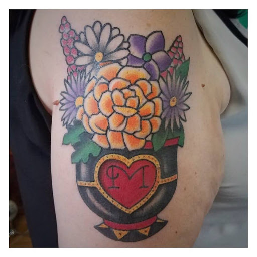 Explore motocross tattoo ideas, creative tattoo ideas in Albany, available at Dead Presidents Lounge