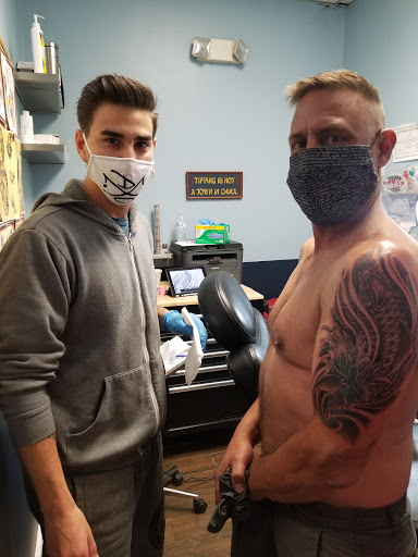 Tattoo Shop «Highlander Tattoo», reviews and photos, 4516 Curry Ford Rd, Orlando, FL 32812, USA