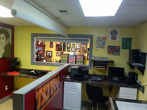 Tattoo Shop «Revelation Ink Tattoo Emporium», reviews and photos, 4672 S Main St, Acworth, GA 30101, USA