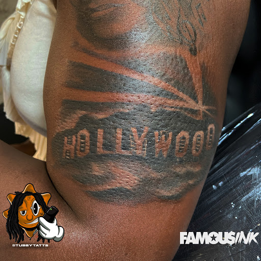 Explore rhea ripley tattoo ideas, creative tattoo ideas in Hammond, available at Famous Ink, Inc.