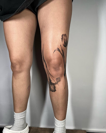 Explore back of the ear tattoo ideas, creative tattoo ideas in Kissimmee, available at Fallen Sparrow Tattoo Co