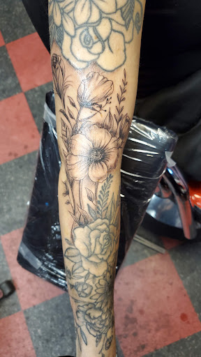 Explore long skinny tattoo ideas, creative tattoo ideas in Jacksonville, available at Jax Ink Tattoo & body piercing