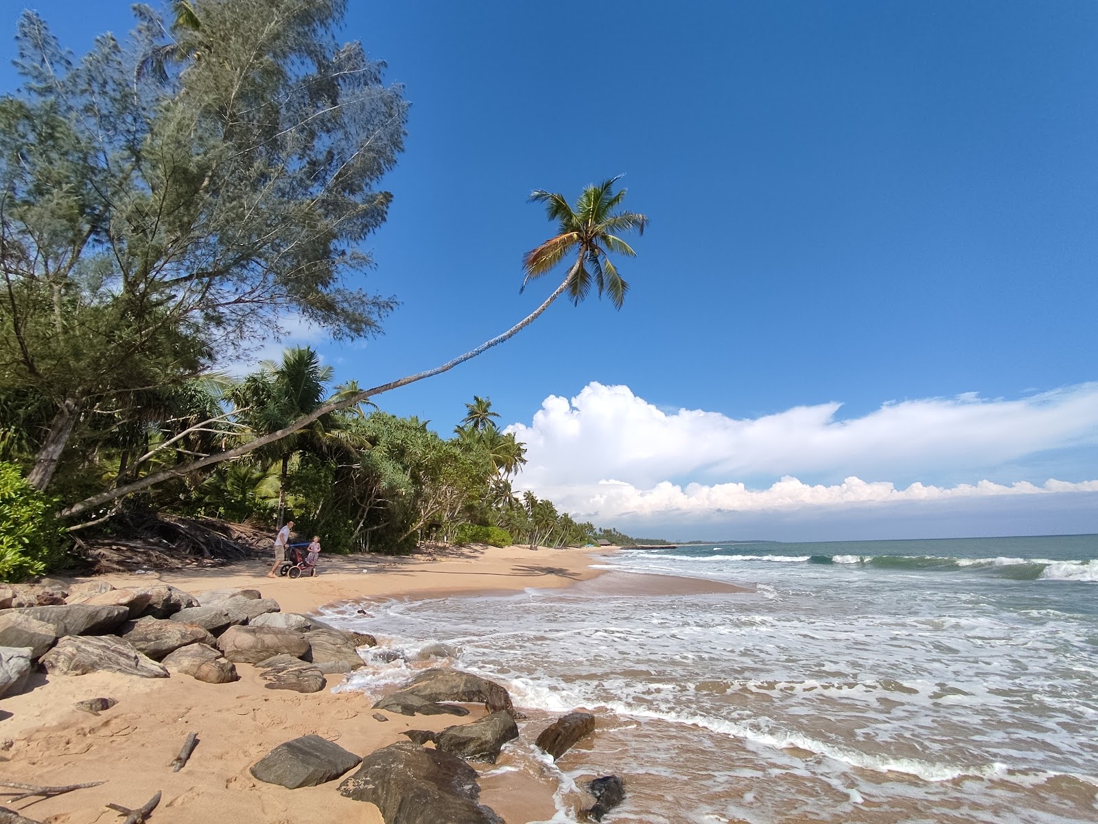 Foto de Harmony Beach com areia bege superfície