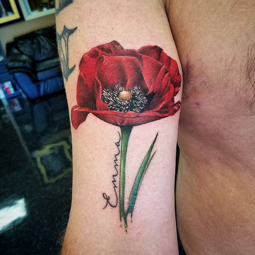 Explore rock and roll tattoo ideas, creative tattoo ideas in Pendleton, available at Just Another Hole in the Wall Tattoo