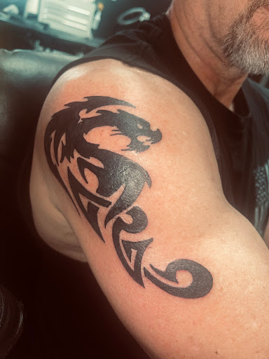 Explore butterfly tattoo ideas for men, creative tattoo ideas in Longview, available at Pale Horse Tattoo & Piercing