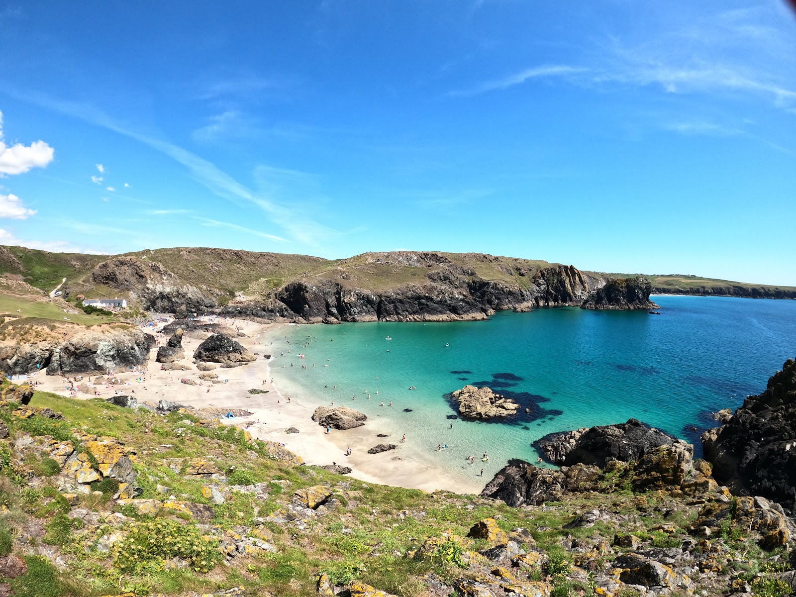 Photo of Kynance Cove with turquoise pure water surface