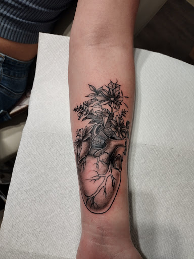 Explore science tattoo ideas, creative tattoo ideas in Bowling Green, available at Clean Line Tattoos