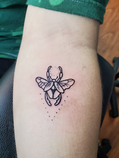 Explore cool guitar tattoo ideas, creative tattoo ideas in Cocoa, available at Rorschach Tattoo Shop and Piercing Studio