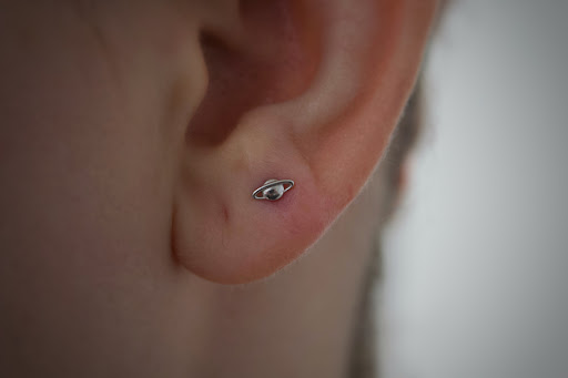 Explore torn skin tattoo ideas, creative tattoo ideas in Corona Del Mar, available at Rainbow Piercing & Jewelry