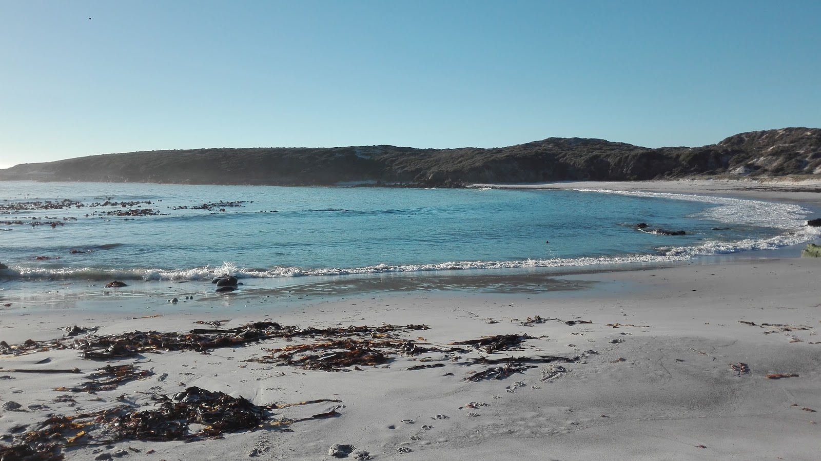 Yzerfontein beach II'in fotoğrafı parlak kum yüzey ile