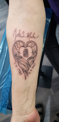 Explore forgiven tattoo ideas, creative tattoo ideas in Youngstown, available at Artistic Dermagraphics