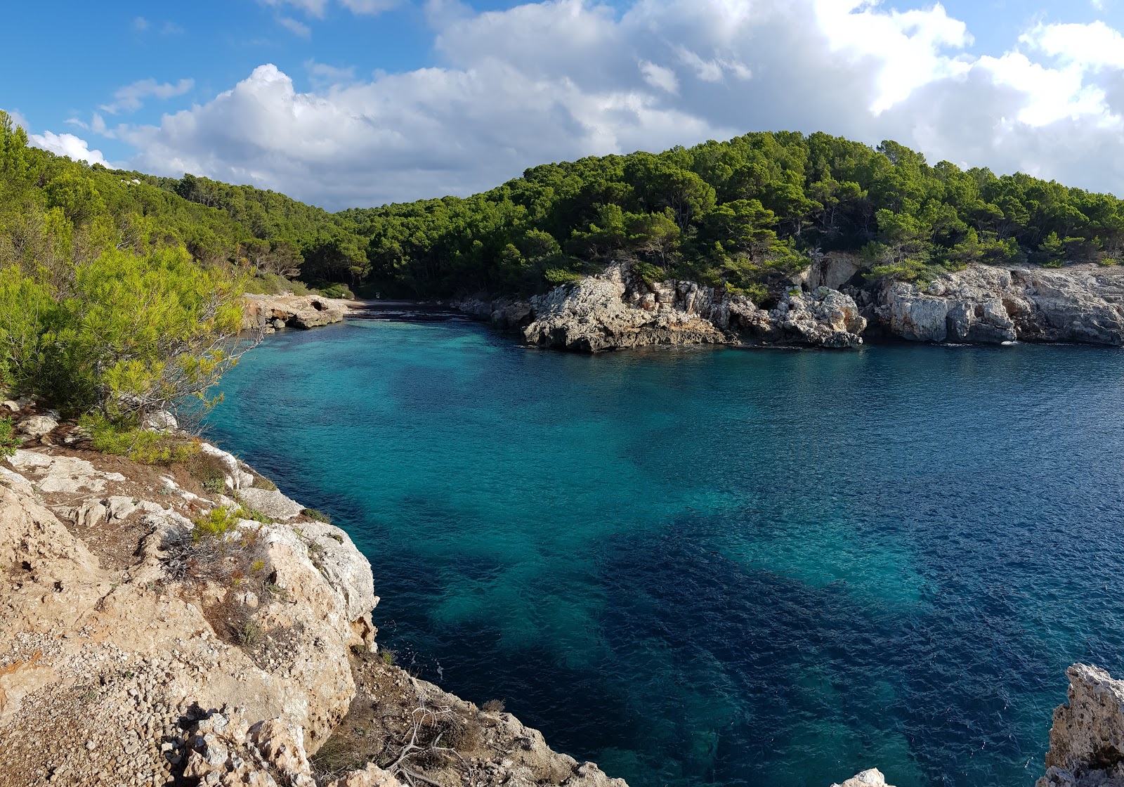 Photo of Cala Fustam with partly clean level of cleanliness
