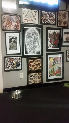 Explore cross forearm tattoo ideas, creative tattoo ideas in Memphis, available at Studio 42