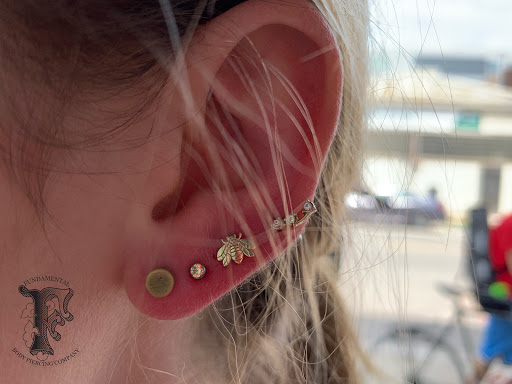 Explore purple rose tattoo ideas, creative tattoo ideas in Chicago, available at Fundamental Body Piercing