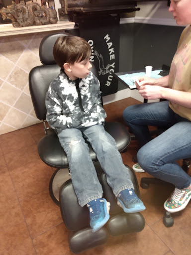 Explore crucifix tattoo ideas, creative tattoo ideas in Osage Beach, available at Rabbits Foot Tattoo Parlor