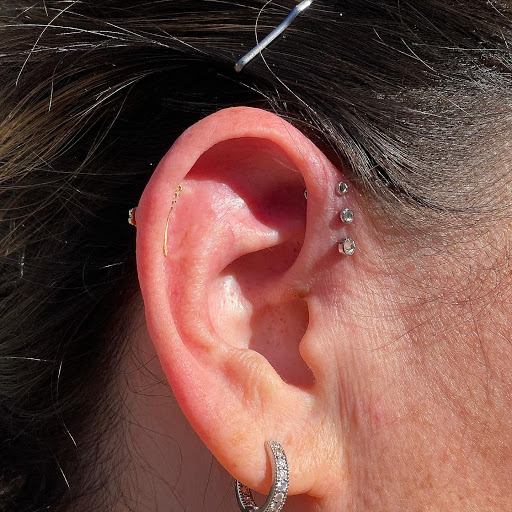 Explore marigold tattoo ideas, creative tattoo ideas in Cary, available at Fine Art Body Piercing By Lilith Mae