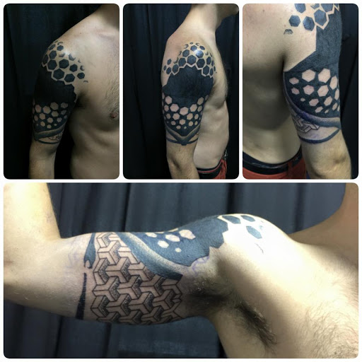 Explore upper back tattoo cover up ideas, creative tattoo ideas in Mount Juliet, available at Division Street Tattoo Company