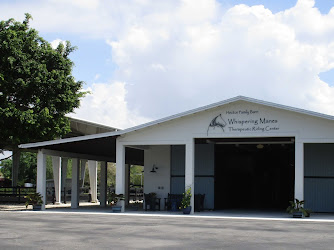 Whispering Manes Therapeutic Riding Center