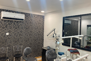 Om Dental Clinic - By Dr. Sunny Khurana image