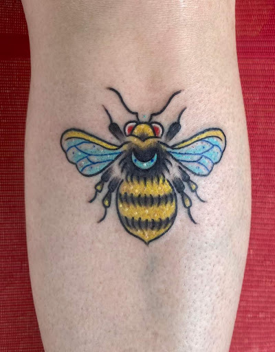 Explore grease tattoo ideas, creative tattoo ideas in Benton, available at Spectrum Tattoo