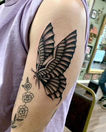 Explore women's tattoo placement ideas, creative tattoo ideas in Delaware, available at Rose & Web Tattoo