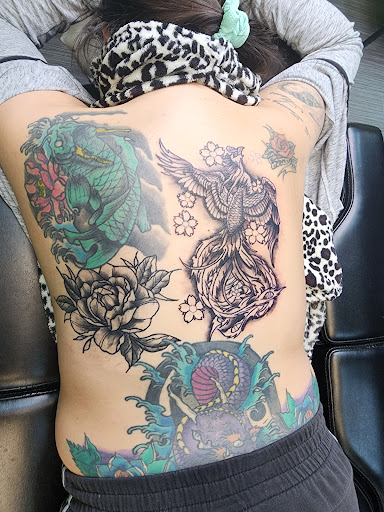 Find chrysanthemum tattoo ideas for your next unique tattoo in Chicago at Mind Crusher Tattoo