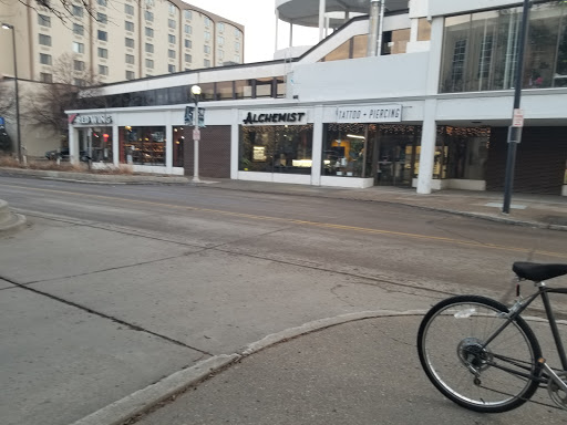 Explore trinidad tattoo ideas, creative tattoo ideas in Bismarck, available at Alchemist Tattoo & Body Piercing