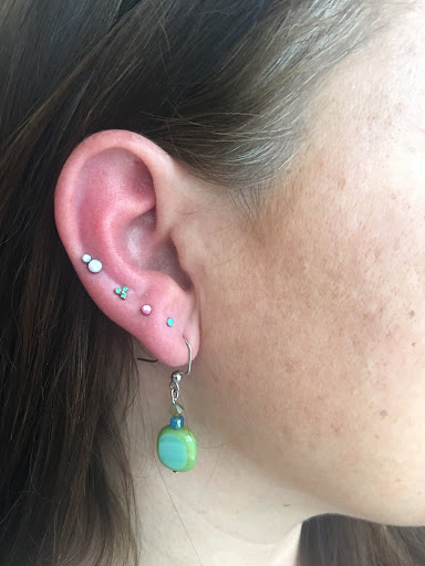 Explore tattoo ideas for two daughters, creative tattoo ideas in Bloomington, available at Evil by the Needle Custom Tattoo and Piercing Studio