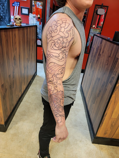 Tattoo Shop «Lucky Dice Tattoos Westgate», reviews and photos, 127 S Blackstock Rd, Spartanburg, SC 29301, USA