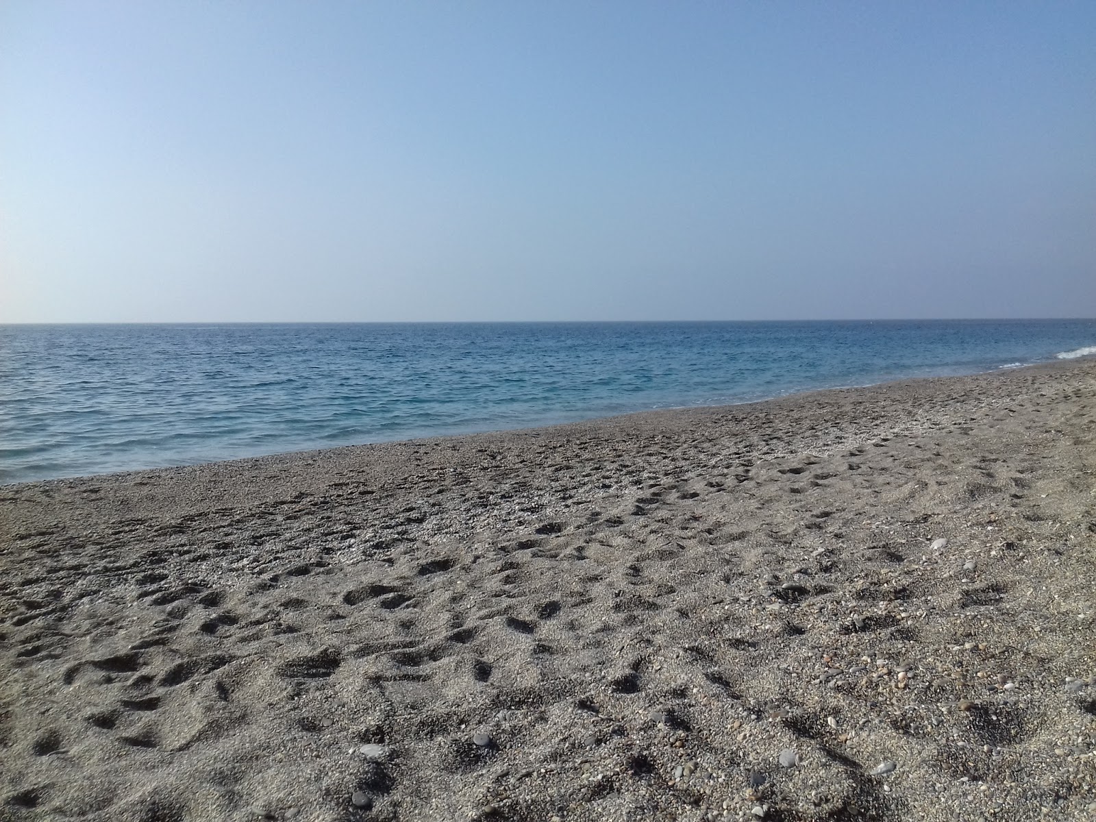 Fotografie cu Guainos beach și așezarea