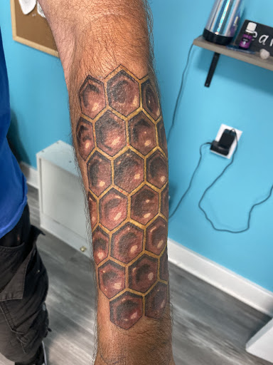 Explore side head tattoo ideas, creative tattoo ideas in Stanford, available at Art Therapy Tattoos & Crafts