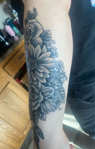 Explore cursive tattoo ideas, creative tattoo ideas in Iowa Falls, available at BiPolar Studios