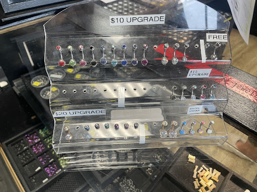 Explore toothless tattoo ideas, creative tattoo ideas in Summerville, available at Exotic Impressions Body Piercing