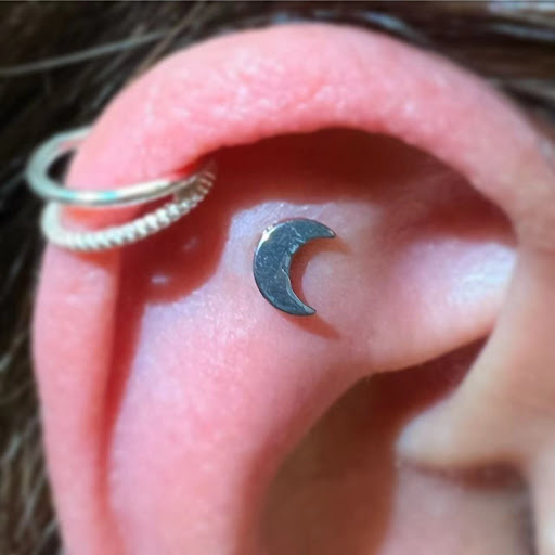 Find tattoo ideas roses for your next unique tattoo in Orange at Baron Art Tattoo