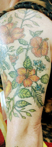 Explore plant tattoo ideas, creative tattoo ideas in Troy, available at InkSlingers Tattoo Shop